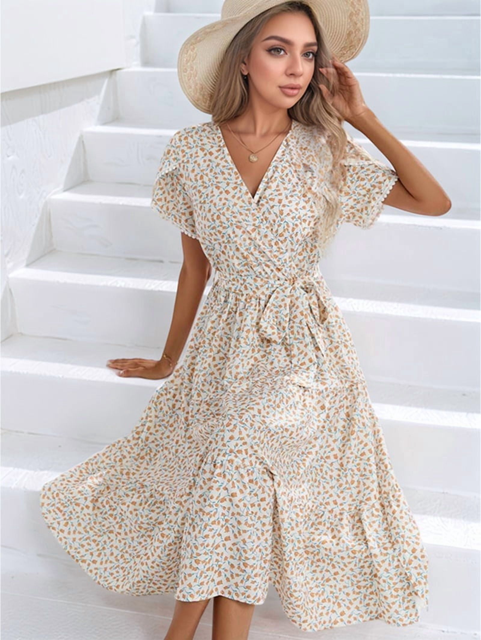 Women's Floral Flutter Sleeve Wrap Dress with Tiered Hem in Cream (photo 6)